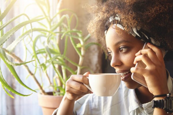 What Are Mild Stimulants? 2 a girl smilling while holding a white cup